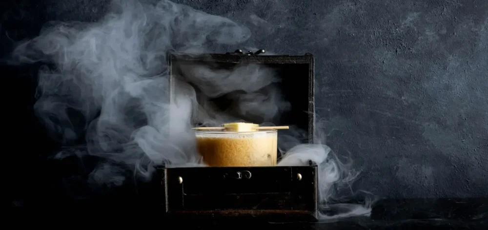 Cocktail in a chest that's smoking.