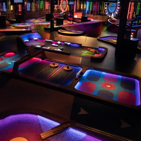 Air hockey and Tetris holes on a course